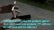 a person is smoking a cigarette with a text behind them that says call back bitch i play the goddamn game
