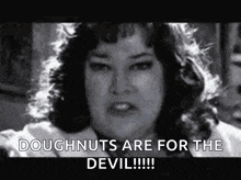 a woman is saying doughnuts are for the devil .