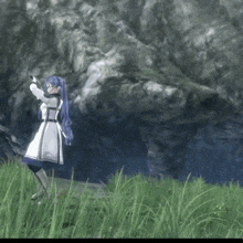 a girl with blue hair is standing in the grass