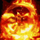 a painting of a skull in flames with a black background