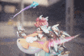 a cartoon character with pink hair and wings is flying through the air with a blue object coming out of her hand
