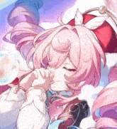 a girl with pink hair is sleeping with her eyes closed .