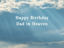 happy birthday dad in heaven is written on a blue sky