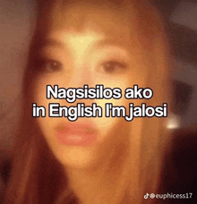 a blurry picture of a woman with the words nagsisillos ako in english i 'm jalosi