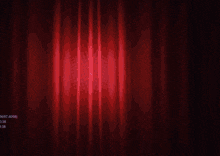 a cartoon character is standing on a checkered floor in a dark room
