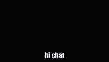 a man in a black shirt is standing in a dark room with the words `` hi chat '' written on the bottom .
