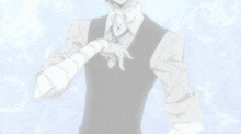 a man with a bandage on his arm is smiling and pointing
