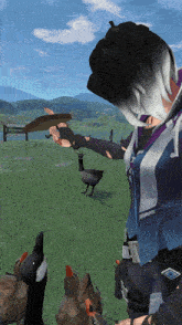 a person standing in a field with ducks and a sign that says t.