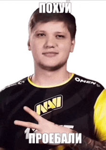 a man wearing a black and yellow navi shirt