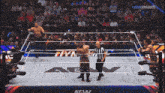 a wrestling ring with the word dynamite on the bottom right