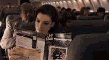 Agent86 Anne Hathaway GIF - Agent86 Anne Hathaway Reading GIFs