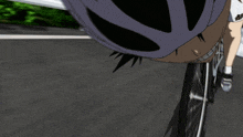 a person wearing a white helmet is riding a bike