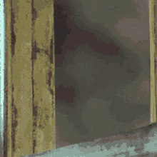 a bear is peeking out of a doorway in a painting