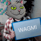 a person with a cat head holds a sign that says wagmi