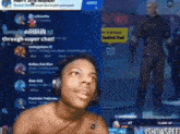 a shirtless man wearing headphones looks at a screen that says ' showspee ' on it