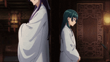 a man and a girl are standing next to each other in front of a door