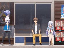 a man sits on a bench next to a girl sitting on a bench in front of a store