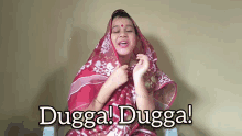 a woman in a red saree says dugga