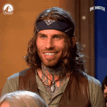 a man with a bandana on his head and a paramount network logo