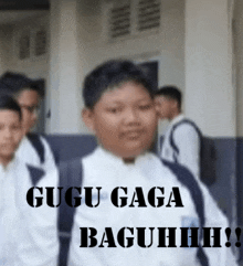 a picture of a boy with the words " gugu gaga baguhhh " on the bottom