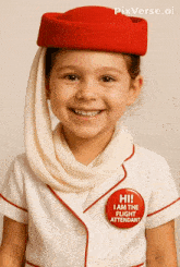 a little girl wearing a flight attendant uniform with a red button that says hi ! i am the flight attendant
