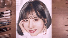 a drawing of a woman 's face with colored pencils