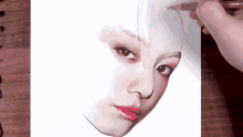 a person is drawing a woman 's face with a brown pencil