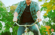 James Mcavoy Riding A Bike GIF - James Mcavoy Riding A Bike Bicycle GIFs