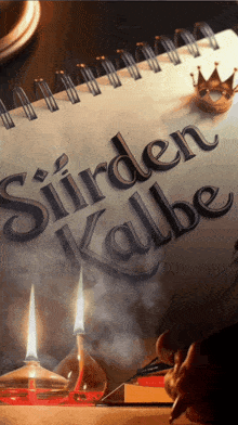 a book titled siirden kalbe has a crown on top of it