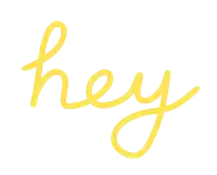 the word hey that is in yellow on a white background
