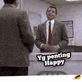a man in a suit and tie is smiling in front of a mirror and the words yg penting happy are above him