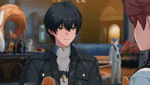 a man with a necklace that says ' x ' on it is talking to another man