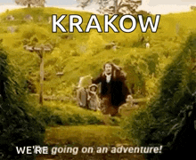 a man and woman are walking through a field with the words krakow we 're going on an adventure ..