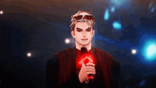 a man is holding a microphone with a red light behind him