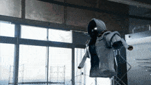 a mannequin in a room with a hoodie on it