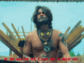 a man without a shirt is standing in front of a sign that says we are waiting for a real one to break out