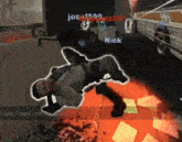 a man is laying on the ground in a video game with nick written on the screen