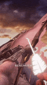 a person holding a bow and arrow with the word behemoth written on the bottom