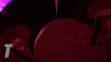 a cartoon character with a mustache is standing in a dark room .