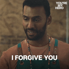 a man says " i forgive you " in a you 're my hero ad