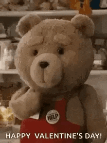 a teddy bear is holding a heart in its paws and says `` happy valentine 's day ! ''