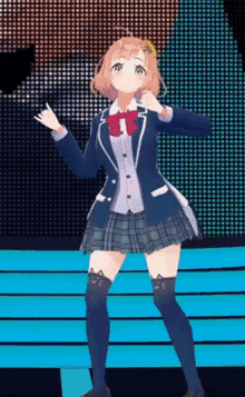 a girl in a school uniform is dancing on a stage in front of a screen .