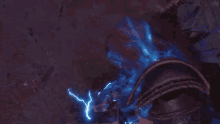 a man is being hit by a lightning bolt while holding a hammer .