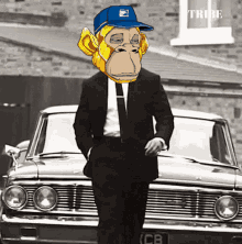 a man in a suit and tie with a monkey face on his head is standing in front of a car that says tribe