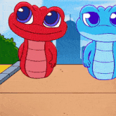 a cartoon of a red snake and a blue snake