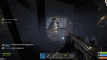 a screenshot of a video game shows a man with a beard and goggles holding a gun