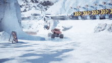 a red monster truck is driving through the snow near a sign that says no