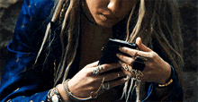 Dinah Lance Phone GIF - Dinah Lance Phone Looking At Phone GIFs