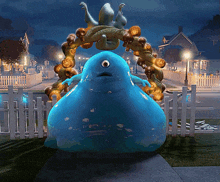 a blue monster with one eye is standing in front of a wreath