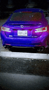a purple lexus with a license plate that reads 70b lnh